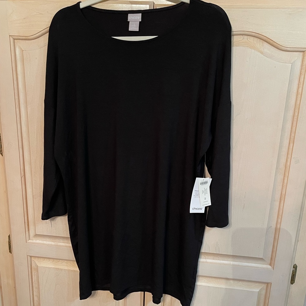 NWT Chicos black tunic top. Size 2, versatile for any occasion dress it up or no